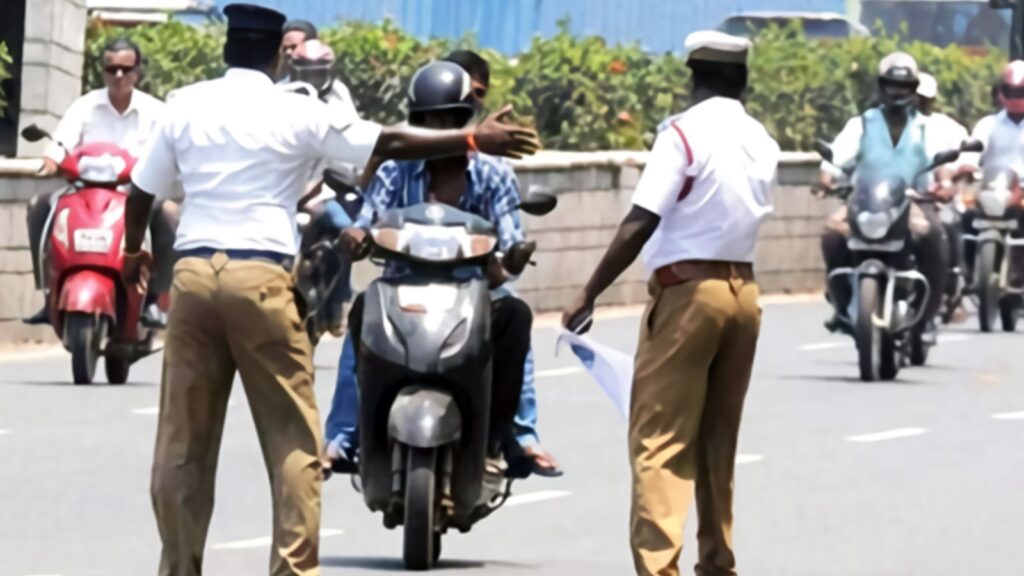 traffic cop stopping scooty rider