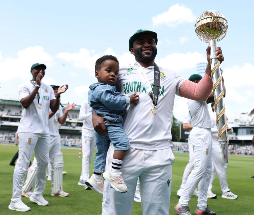 Temba Bavuma celebrating the WTC victory with his minor son