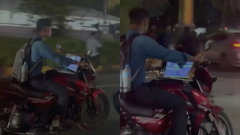 Work From Home-லாம் பழசு… இனி “Work From Bike” தான் புதுசு! வைரலாகும் ஹைதராபாத் வாலிபர்! Work from bike